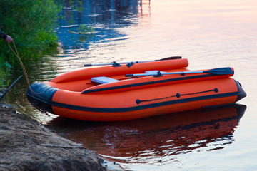 Rubber boat on the river. Fishing boat.