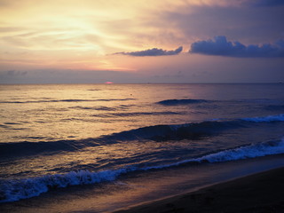 Fototapeta premium picturesque Pink sunset on lake beach sea sand beautiful colors in the sky clouds