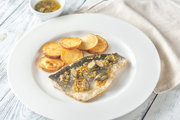 Baked sea bass with capers