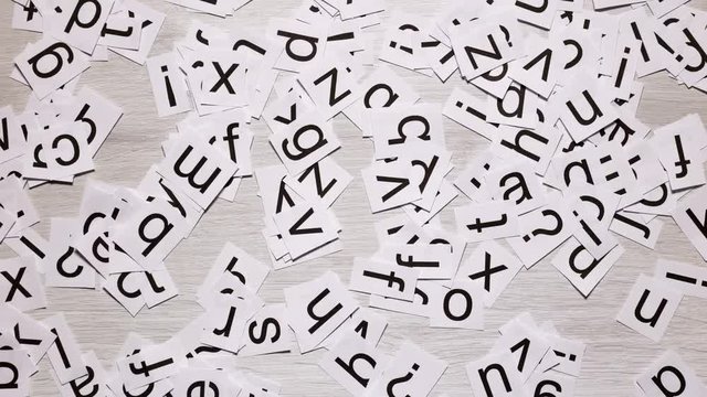 Stop Motion Of Letters That Form The Question "How?"