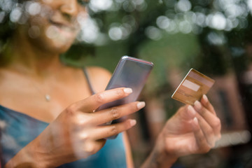 Woman online shopping on mobile phone
