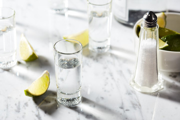 White tequila with lime and salt.