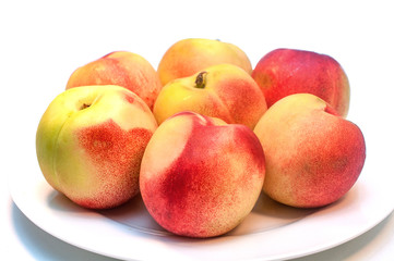 Fresh nectarines isolated on white background