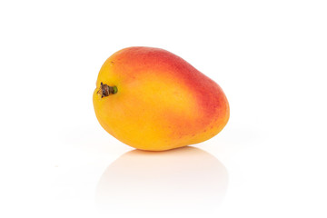 One whole fresh orange apricot isolated on white background