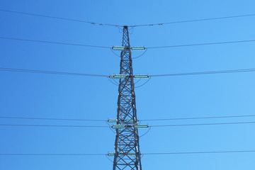 Electric wire electric tower. High voltage electricity pole on sky background.