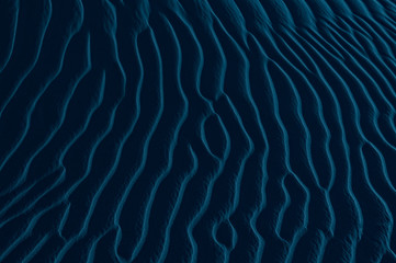 Sand texture background. Blue tint.