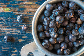 Juniper Berries in a Measuring Cup