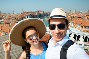 Couple Taking Selfie From Rialto Bridge, Venice, Italy