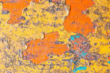 park benches with worn paint forming different colors, textures and shapes painting photography