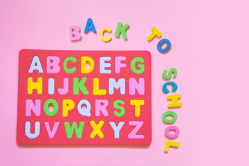 Colored alphabet letters. Back to school. Childhood education, learning english, preschool and kids game concept. Kids lettering leisure idea.
