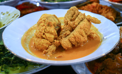 Fish Eggs Curry (gulai telor ikan) at Padang Restaurant in Jakarta, Indonesia.