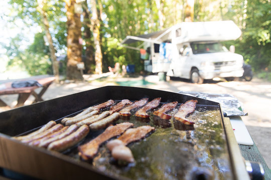 Breakfast Cooking On A Camp Grill Outside