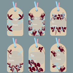 Light gray labels with abstract plants of light blue and dark red colors