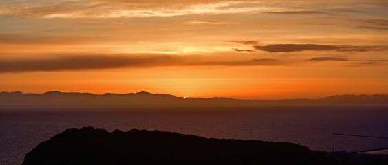 Fototapeta na wymiar 室蘭から内浦湾越しに見た夕焼けの情景＠北海道