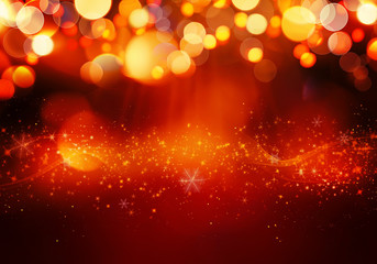 Golden red Christmas or New Year background with glitter, snowflakes, stars, bokeh gold lights on...