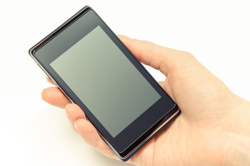 Hand of woman holding smatphone with blank screen