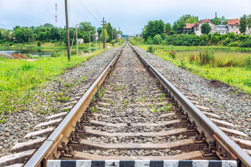 Railway bed in the Russian village, close-up. Space for text.