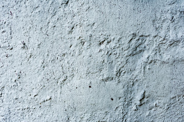 Texture of a concrete wall with cracks and scratches which can be used as a background