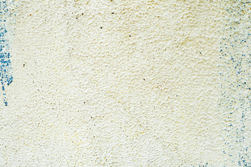Texture of a concrete wall with cracks and scratches which can be used as a background