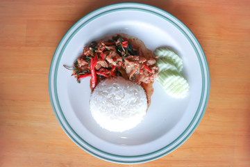 stir-fried pork with chili, holy basil and rice