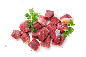 Raw chopped beef meat with spices. isolated on white background