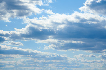 Fototapeta premium Bright beautiful blue sky with clouds for background or texture