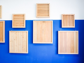 vintage wood frames on old blue wall