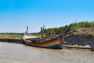 landscape image of a boat in river indus