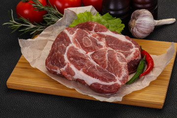 Raw pork neck steak