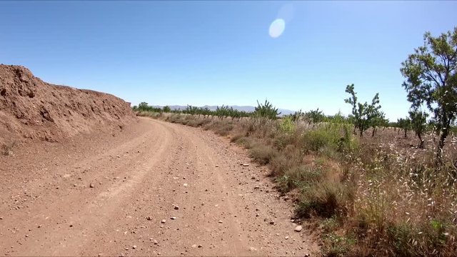 a rural path and a storehouse between Cogollos de Guadix and Guadix, province of Granada, Andalusia, Spain