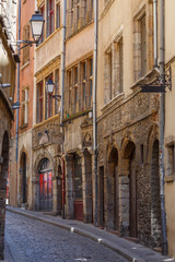 Fototapeta na wymiar LYON / FRANCE - JULY 2015: Narrow street in the historic centre of Lyon, France