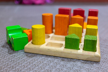 Wooden building blocks on table