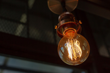 Close up of Illuminated light bulb with copy space.
