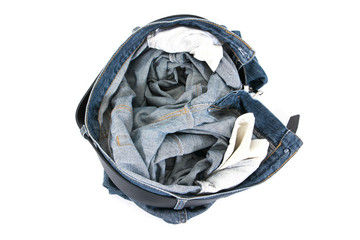 Take off jeans trousers with belt isolated on white background. Undress pants with belt isolated