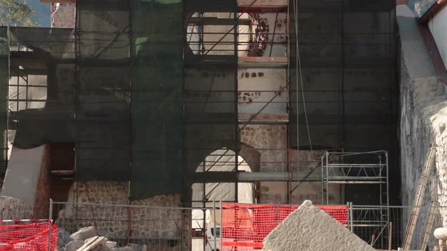 works on an ancient monument, restoration of italian art heritage in Venzone