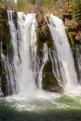 Close up of Burney Falls waterfall with Rainbow near Redding, in California