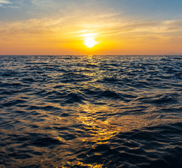 Fototapeta na wymiar Expanse of water in the sea at sunset