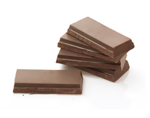 Dark Brown Chocolate Pieces Heap on White Background