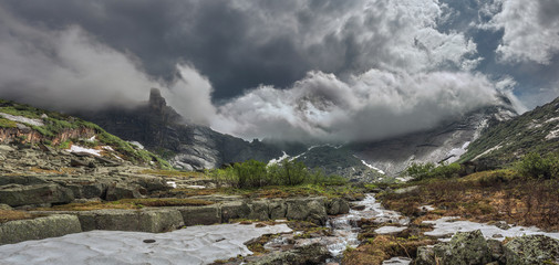 mountain tops in the clouds