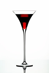 Triangular Glass of Red Drink