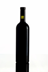 Bottle of red wine on a white background