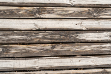 closeup rustic wooden wet desk pathway beach. background with nice texture