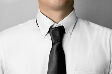 Necktie binding on business suit