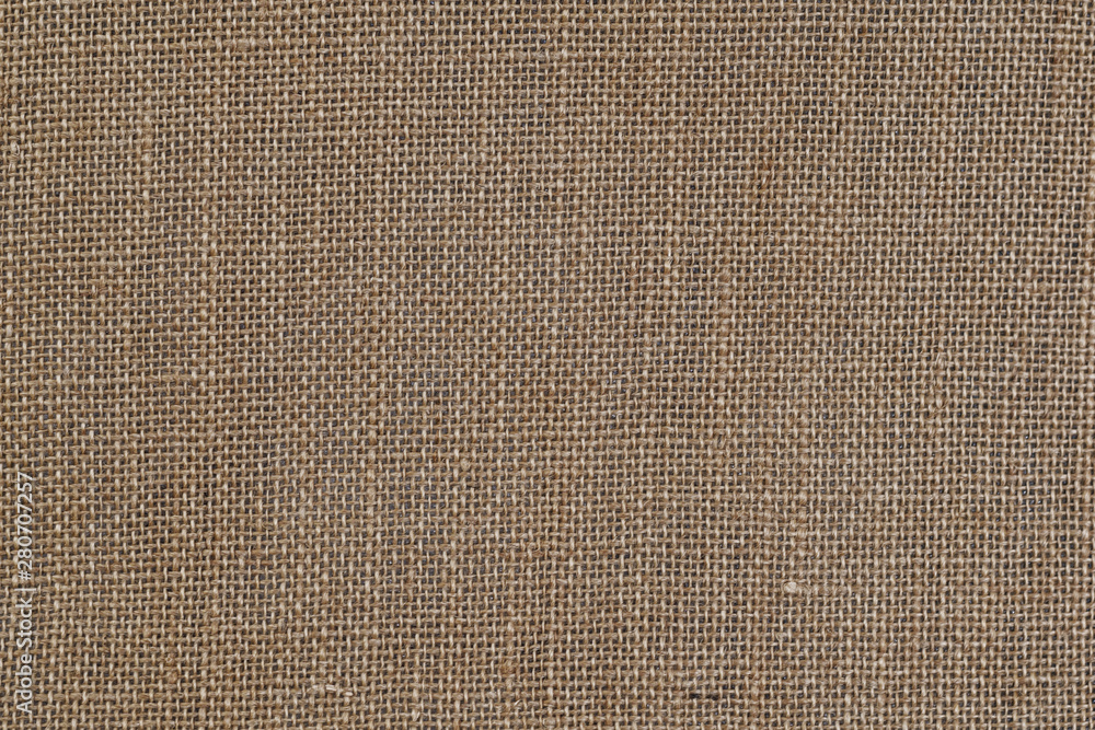 Poster sackcloth texture background.use us copy space for text and design on old sackcloth textured backdro
