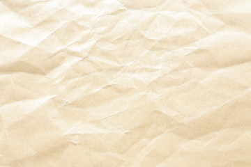 Old brown crumpled Kraft paper background texture