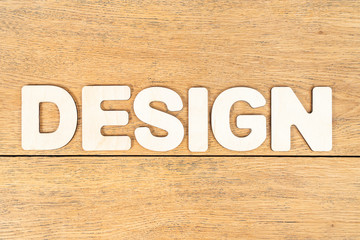 word design of wooden letters on table
