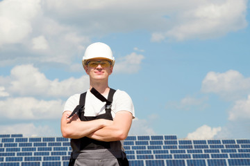 Solar panels engineer in white cask