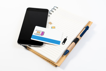 Micro sim and nano sim preparing for install and setup in smartphone for travel plan concept. Changing the SIM card on smartphone for travel.