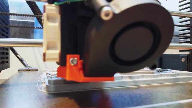 Automatic three dimensional 3d printer performs product creation. Modern 3D printing can halp to make prototype..