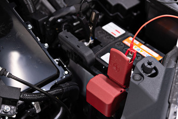 Charging car battery with charger